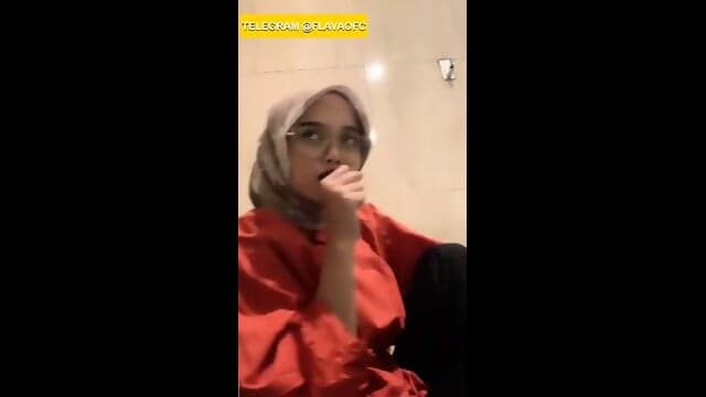 Hijab Girl playing with her tits in public toilet