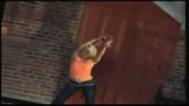 Woman strips in front of the wrong door.