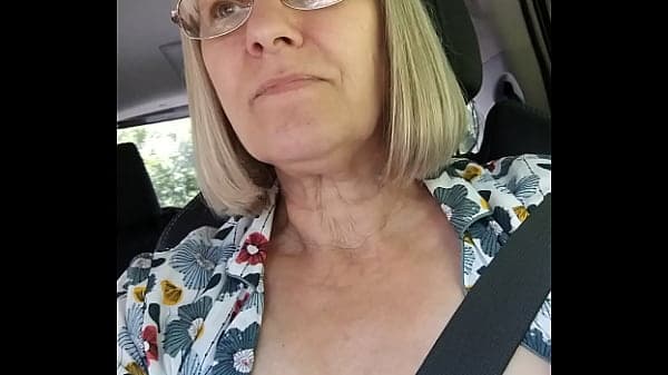 Driving down the road with my tits out