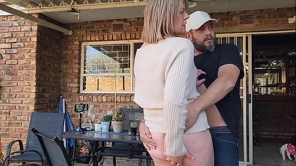 Fucking his wife on the patio